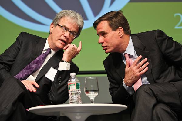 Tom Coburn and Mark Warner exchange views at the 2012 Bretton Woods Committee Annual Meeting