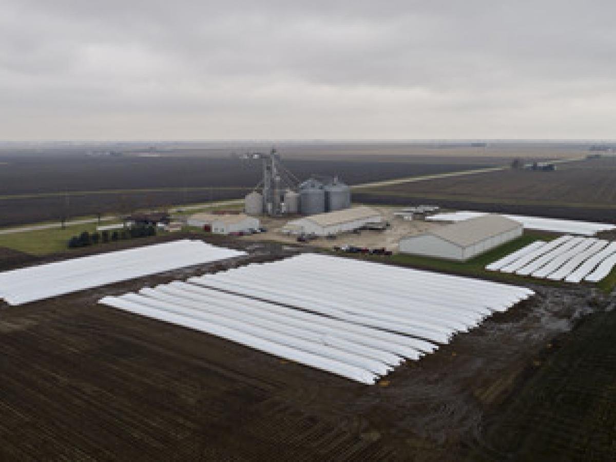 EU officials hope market forces will boost some U.S. exports, such as soybeans, providing breathing room as talks continue. Bags of corn and soybeans at Gingerich Farms in Lovington, Ill. DANIEL ACKER/BLOOMBERG NEWS