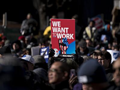 A rally Thursday outside the AFL-CIO headquarters in Washington to end the government shutdown. During the first week of the shutdown, 4,760 federal employees filed for unemployment benefits, the Labor Department said. PHOTO: ANDREW HARRER/BLOOMBERG NEWS